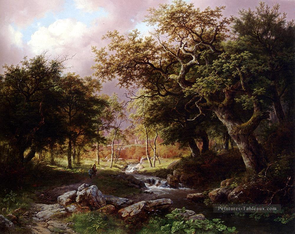 Un paysage boisé avec des personnages le long d’un ruisseau néerlandais Barend Cornelis Koekkoek Peintures à l'huile